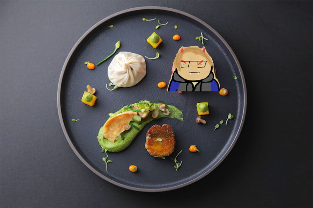 A fancy molecular gastronomy meal on a fancy plate. There are brightly colored scoops and foams scattered across the plate, a